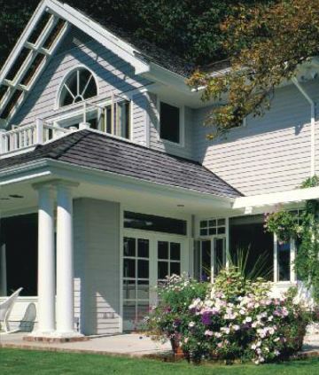 House with decorative siding in Ashland, MA.